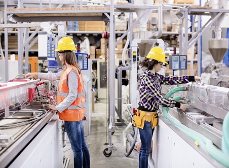 Two women working in manufacturing environment