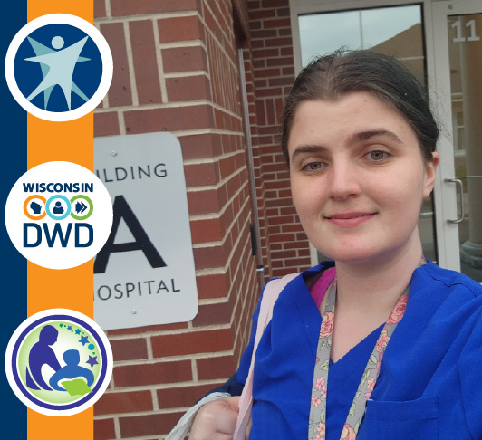 Photo of Kayla at her work, wearing her work uniform
