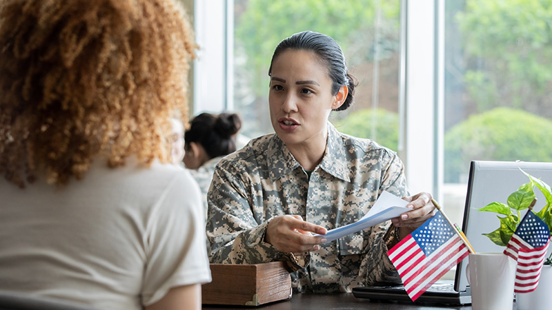 person helping veteran get job