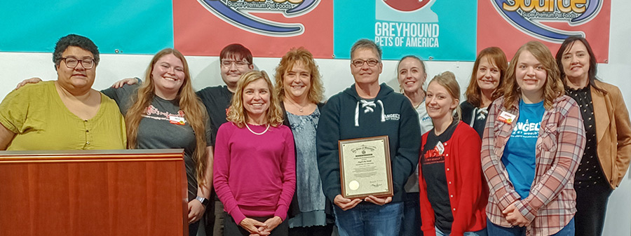 Angel Duratti, Owner of Angel's Pet World is pictured (center) here with her staff, along with Sonya Breymeier, Owner of Sonya's Employment Options LLC (back center right), and DVR representatives.