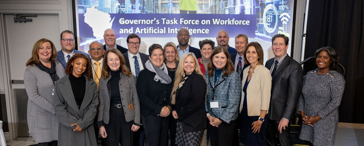 Members of the Governor's Task Force on Workforce and Artificial Intelligence gathered for a group photo at the Concourse Hotel in Madison following the task force's inaugural meeting on Monday, Oct. 30, 2023.
