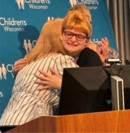 Photo of Graduate Misty Gerber hugging Kristi Status, Project SEARCH instructor at Children's Wisconsin /CESA#1